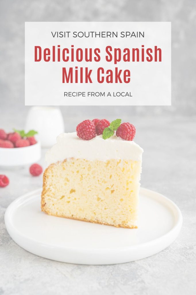 a slice of tres leches cake with raspberry. On top it's written Delicious Spanish milk cake.