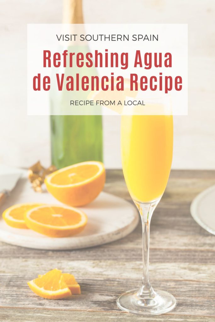 agua de valencia in a glass. On top it's written refreshing agua de valencia recipe.