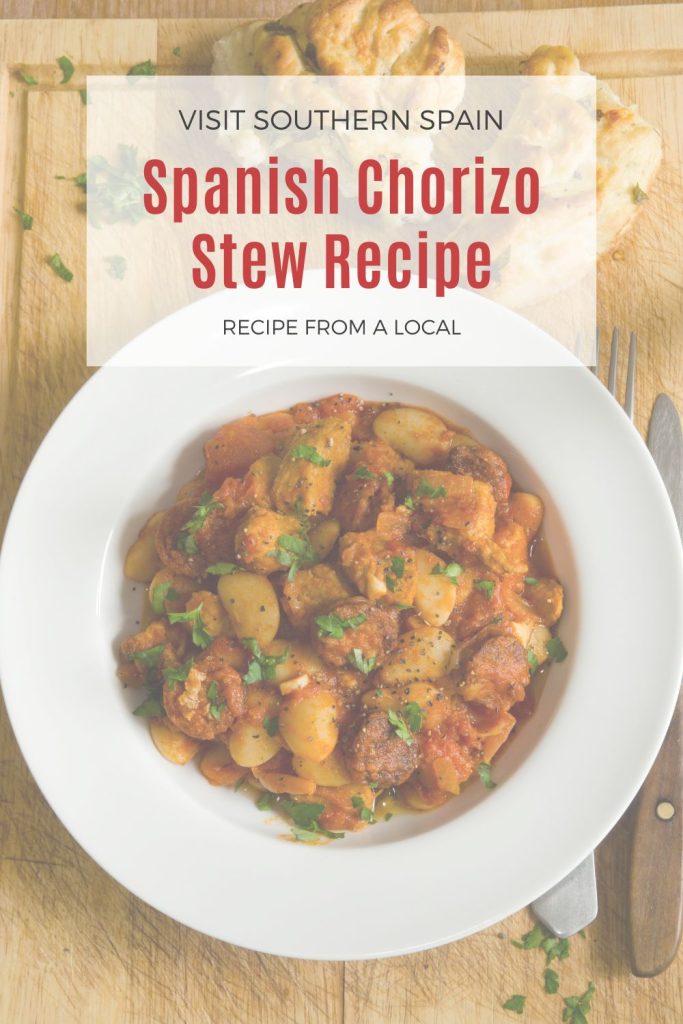 chorizo stew served in a white plate. On top it's written Spanish chorizo stew recipe.