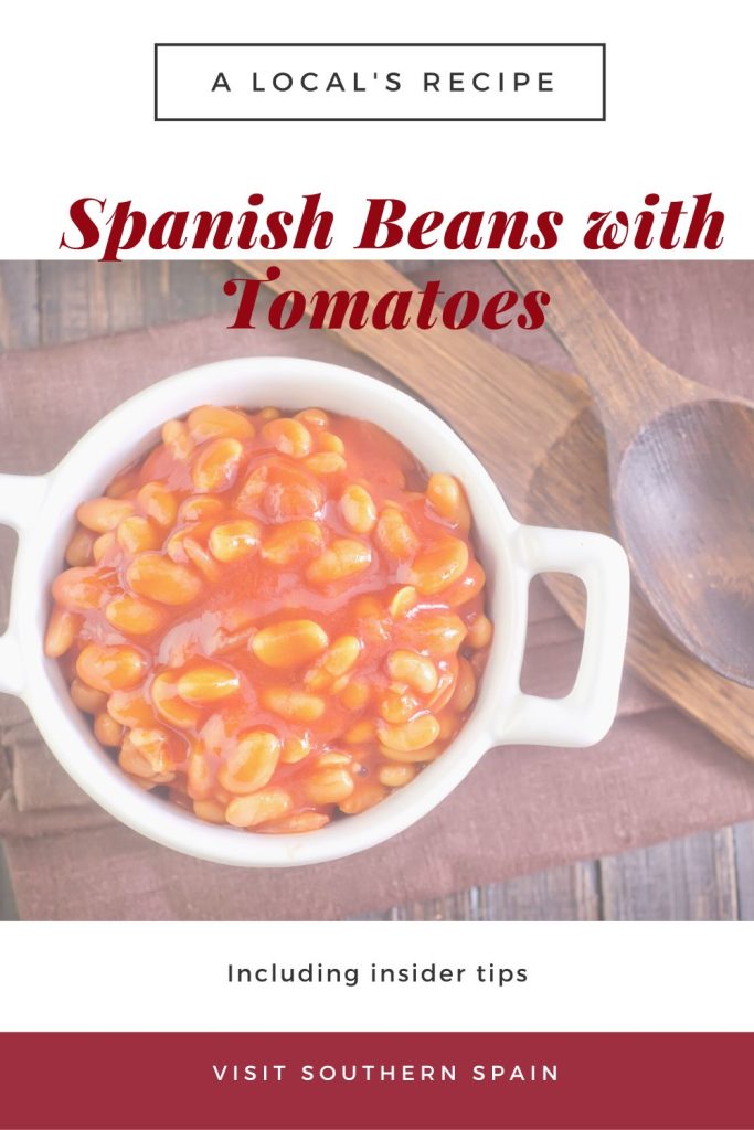 Spanish beans in a bowl. On top it's written Spanish beans with tomatoes.