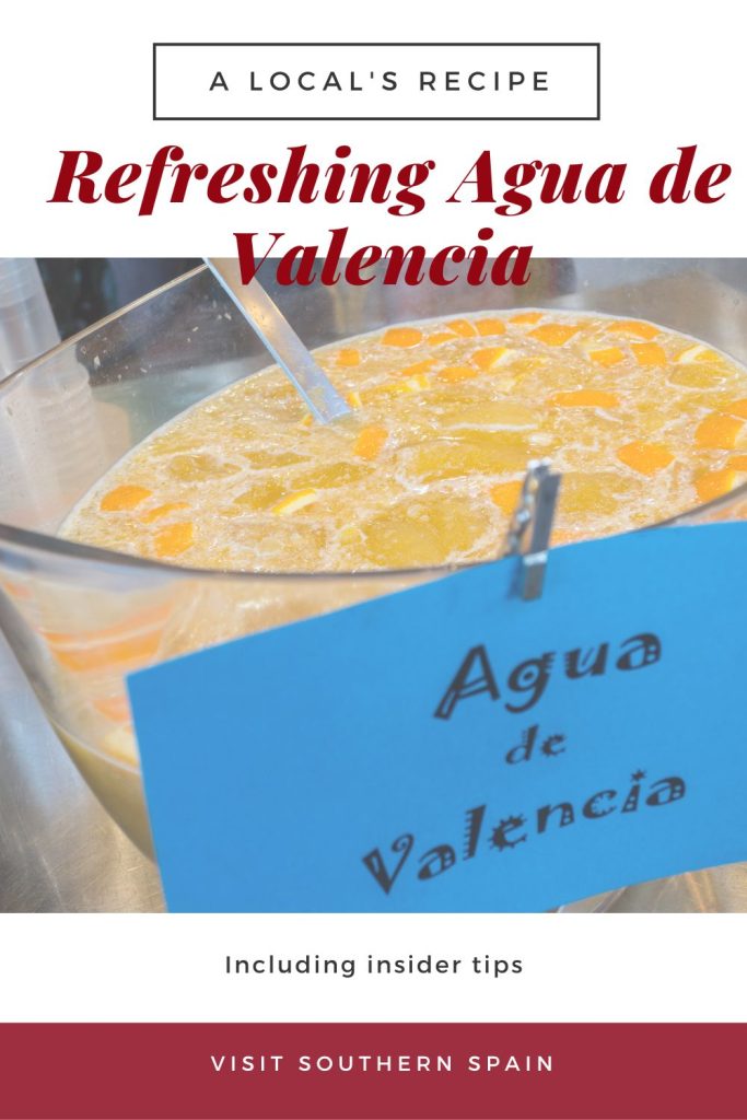 agua de valenica in a big jug. On top it's written refreshing agua de valencia.