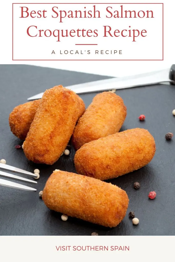 salmon croquettes on a black plate. On top it's written Best Spanish salmon croquettes recipe.