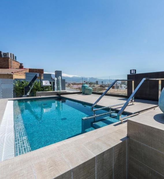 rooftop pool at Catalonia Granada, best 4 star hotels in granada