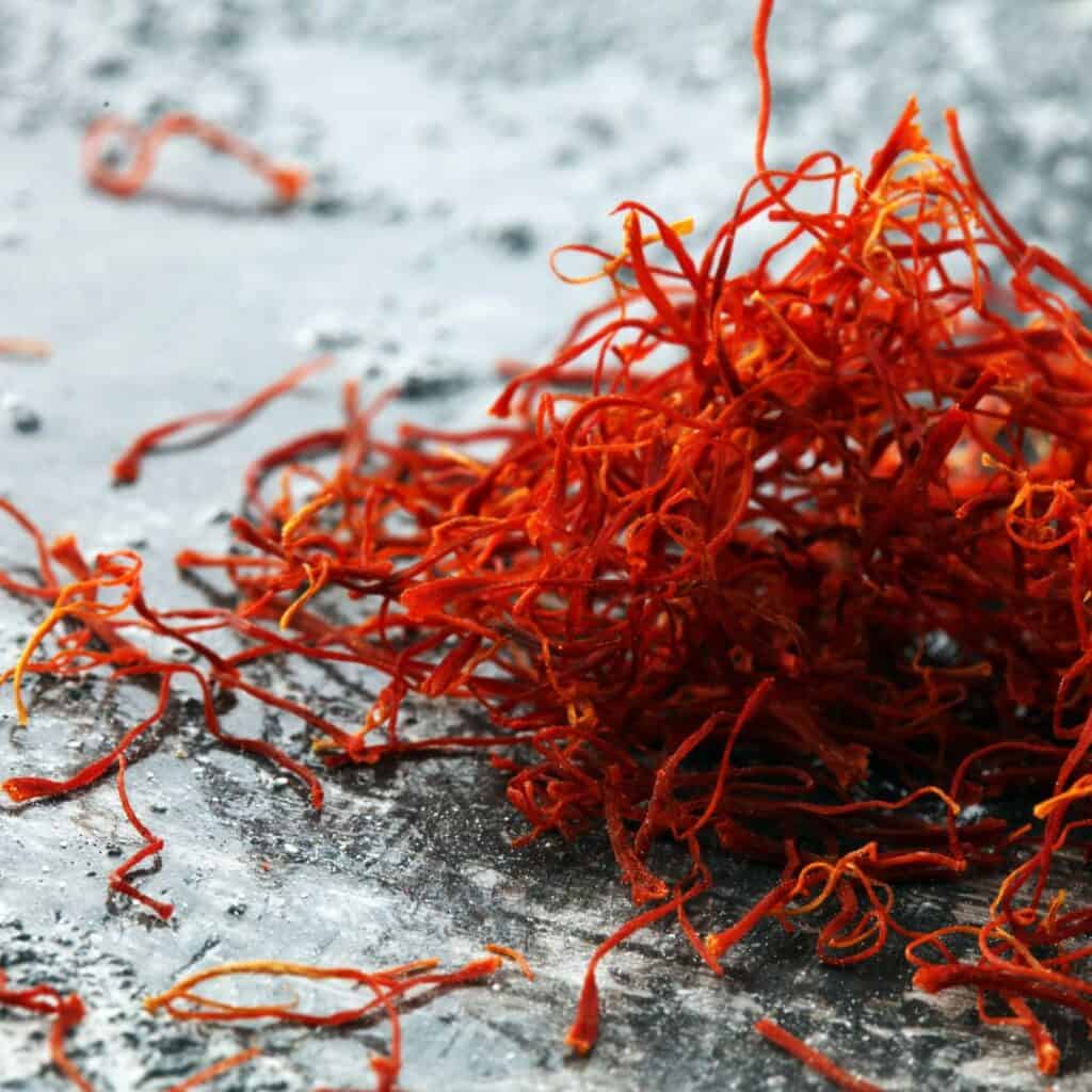 a pile of red saffron on a table