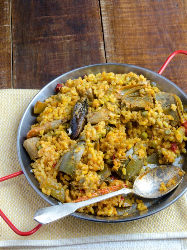 Vegetable Paella made with rice and vegetables in a paella pot