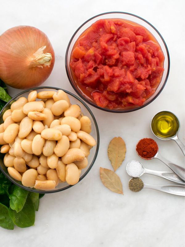 ingredients such as beans, onion, tomato for the spanish beans and tomatoes recipe.