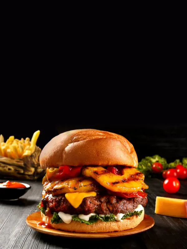 spanish chorizo burger loaded with cheese tomatoes and salad. - Best Spanish Chorizo Burger Recipe