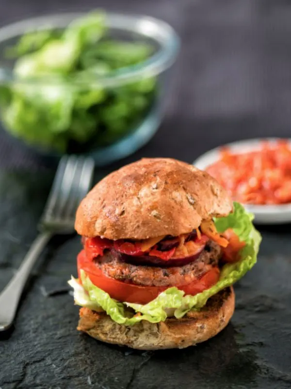 mackerel patty recipe used to make a burger with tomatoes and salad