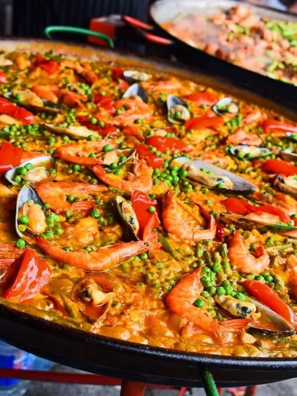 closeup of spanish paella in a traditional pan