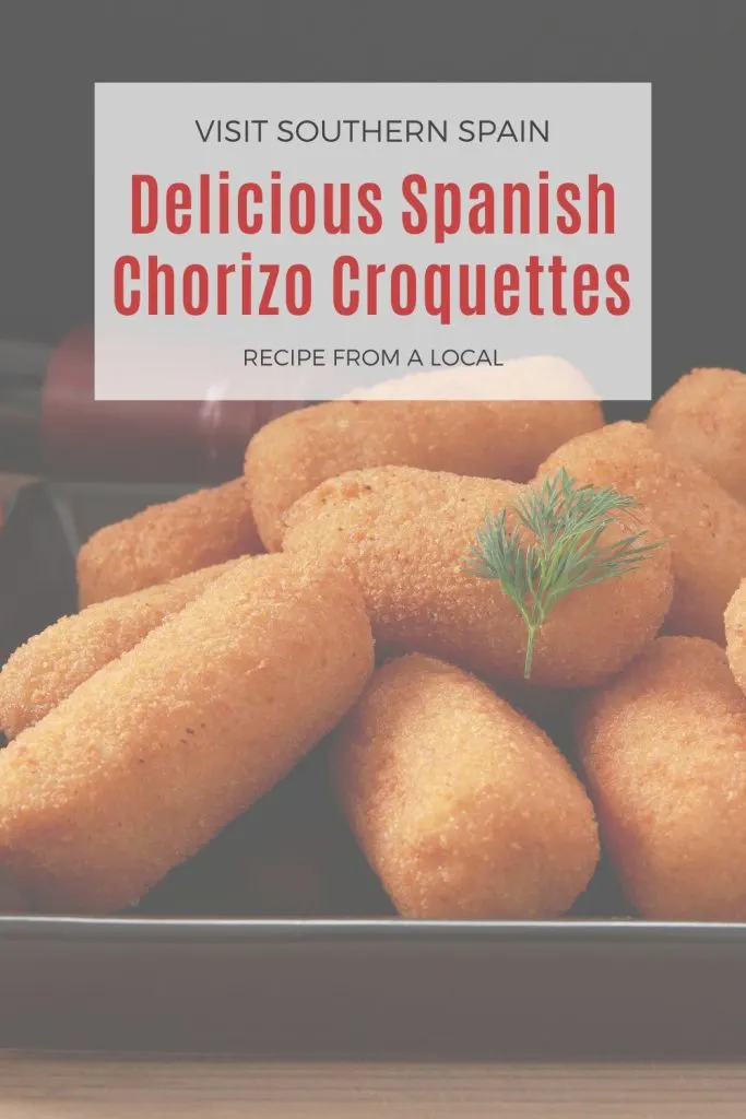 closeup with croquettes in a tray. On top it's written delicious spanish chorizo croquettes.
