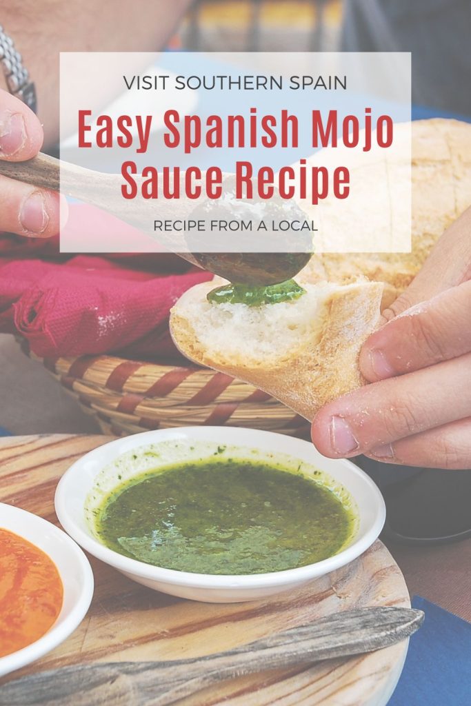 closeup with mojo sauce on a piece of bread. On top it's written Easy Spanish mojo sauce recipe.