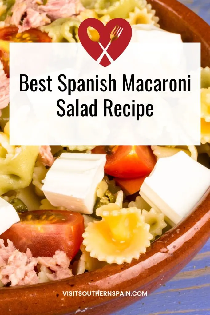 closeup with macaroni salad in a clay bowl. On top it's written best spanish macaroni salad recipe. 