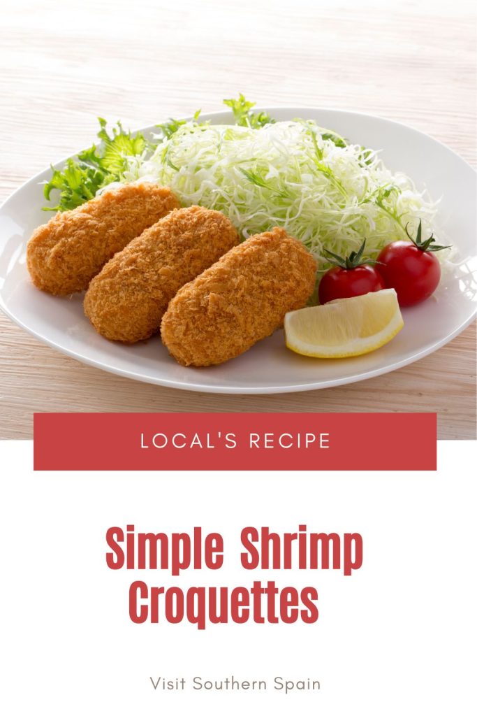 croquettes served with salad. Under it's written simple shrimp croquettes. 