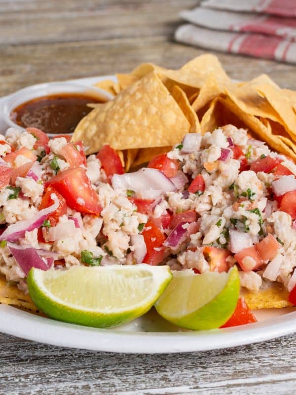 Spanish ceviche recipe with cod fish and fresh vegetables.