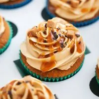 closeup with dulce de leche cupcakes, decorted with frosting and dulce de leche