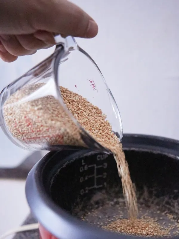 cooking quinoa in a pot for the quinoa spanish rice