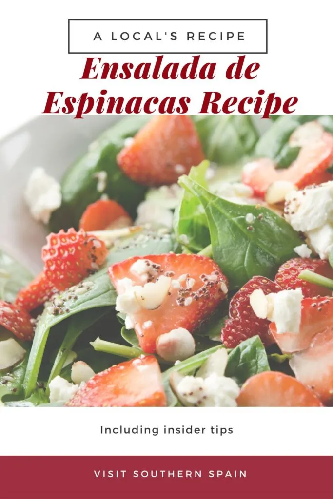 a pin with a closeup of ensalada de espinacas, spanish spinach salad with stawberries.
