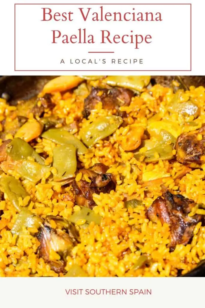 closeup with valenciana paella recipe, rice with chicken and rabbit.