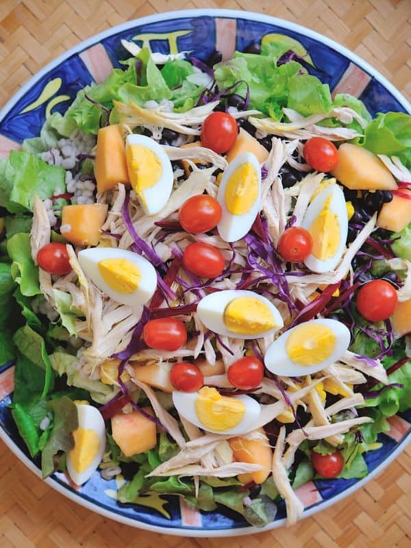 ensalada de pollo, chicken salad from spain with eggs on a plate