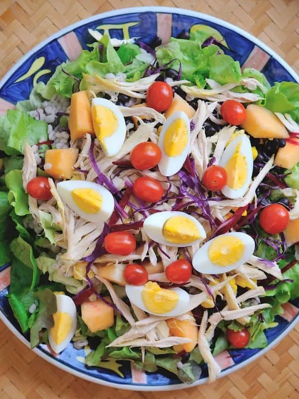 ensalada de pollo, chicken salad from spain with eggs on a plate