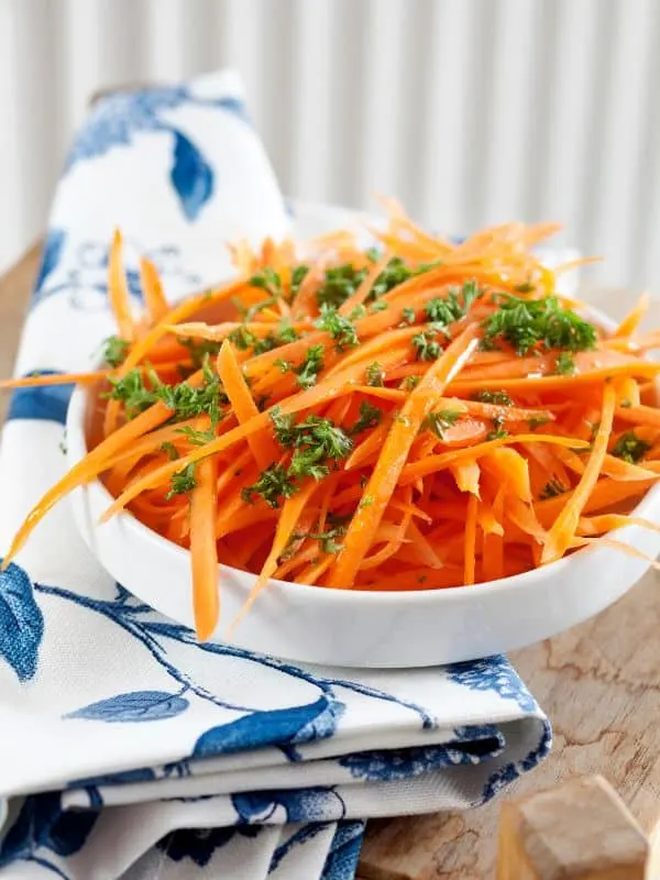 ensalada de zanahoria, spanish carrot salad in a white bowl