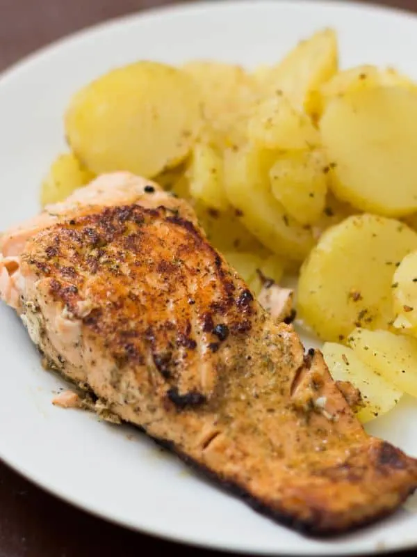 spanish salmon recipe served with potatoes