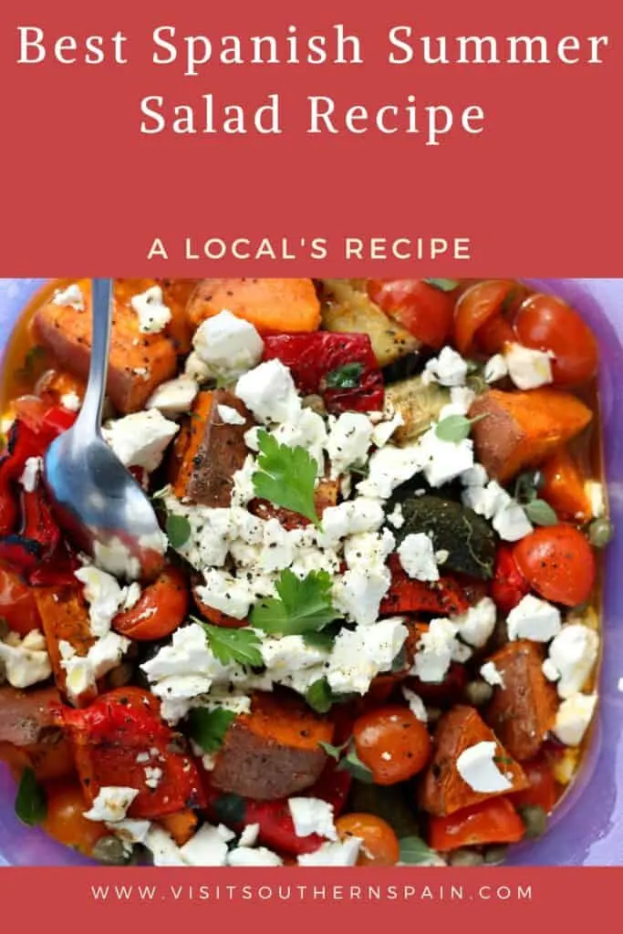 a pin with a fresh spanish summer salad with tomatoes, onion and feta.