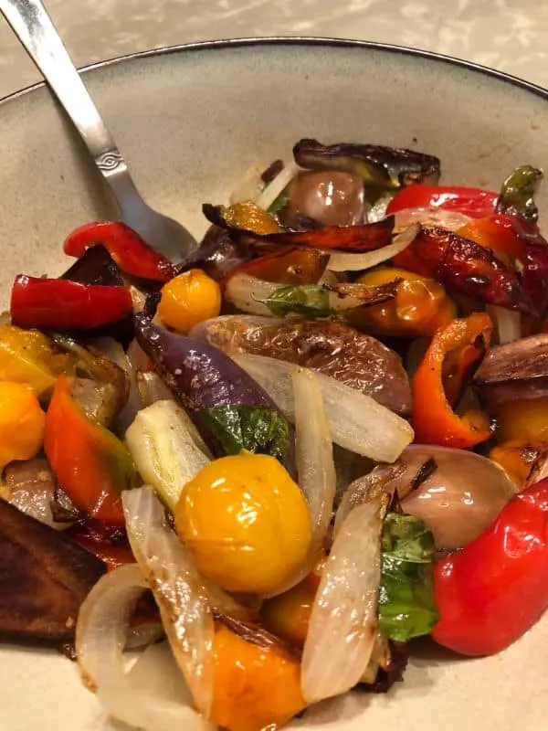closeup of a grilled veggie salad in a bowl