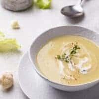 chilled cauliflower soup in a white bowl