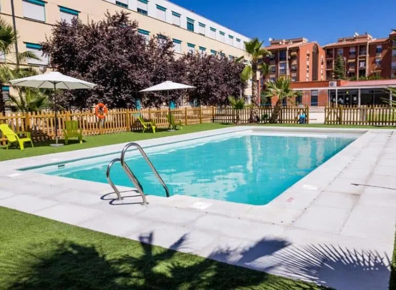 exterior pool at one of the best Granada hotels with pool, the Apartamentos Fernando de los Rios