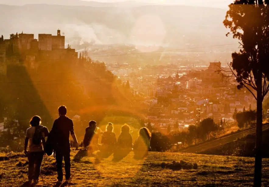 people enjoying a sunset walking tour in Albaicin & Sacromonte, Granada