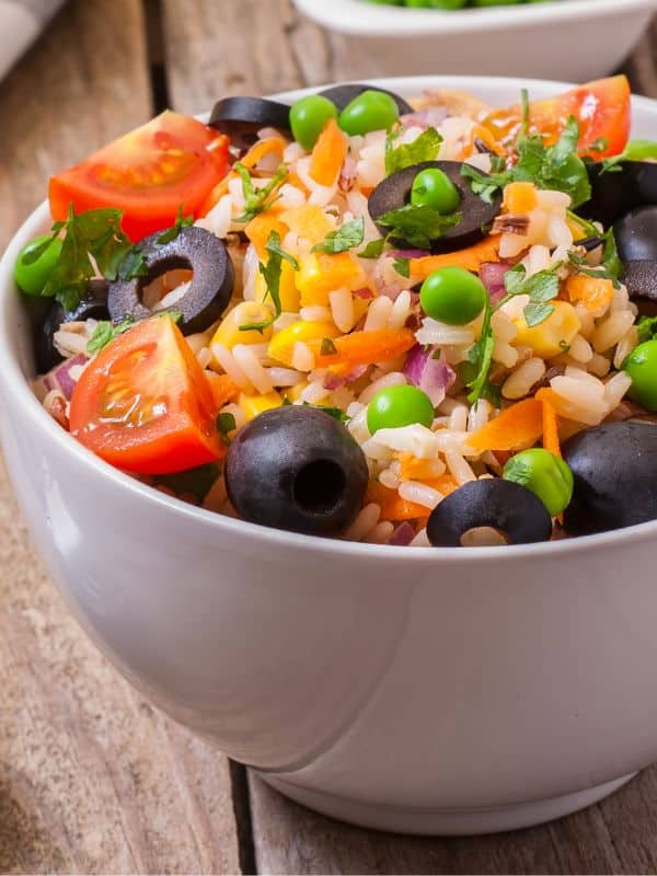 spanish rice salad with tomatoes olives and vegetables - Best Spanish Rice Salad Recipe