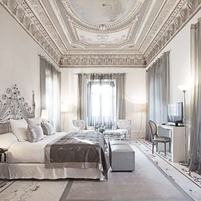 beautifully decorated bedroom at luxury hotels in Granada at Hospes Palacio de los Patos
