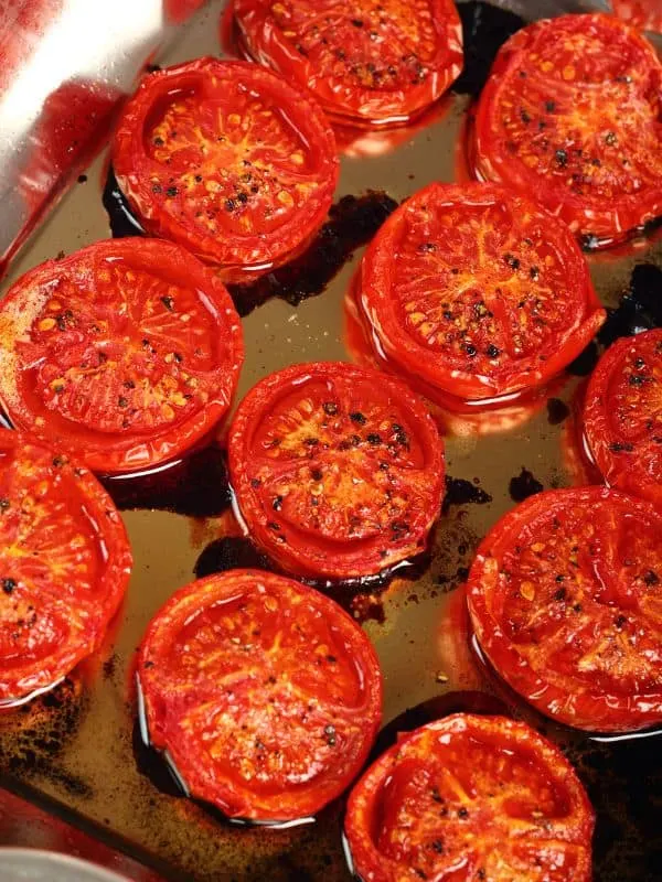 roasted tomatoes in a pan for the roasted tomato gazpacho