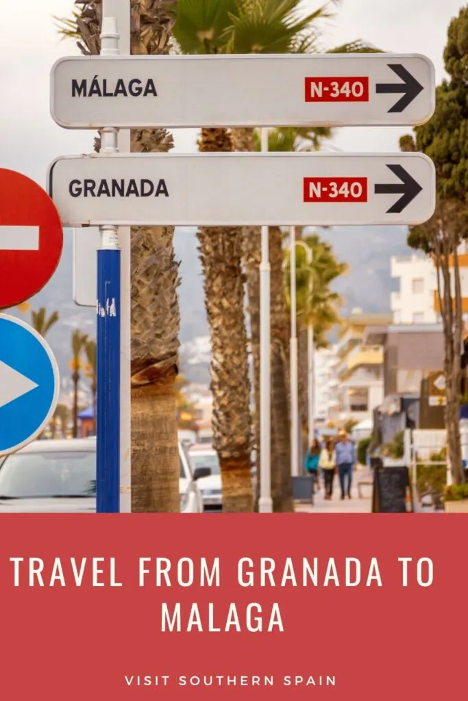 a pin with road signs from Granada to Malaga