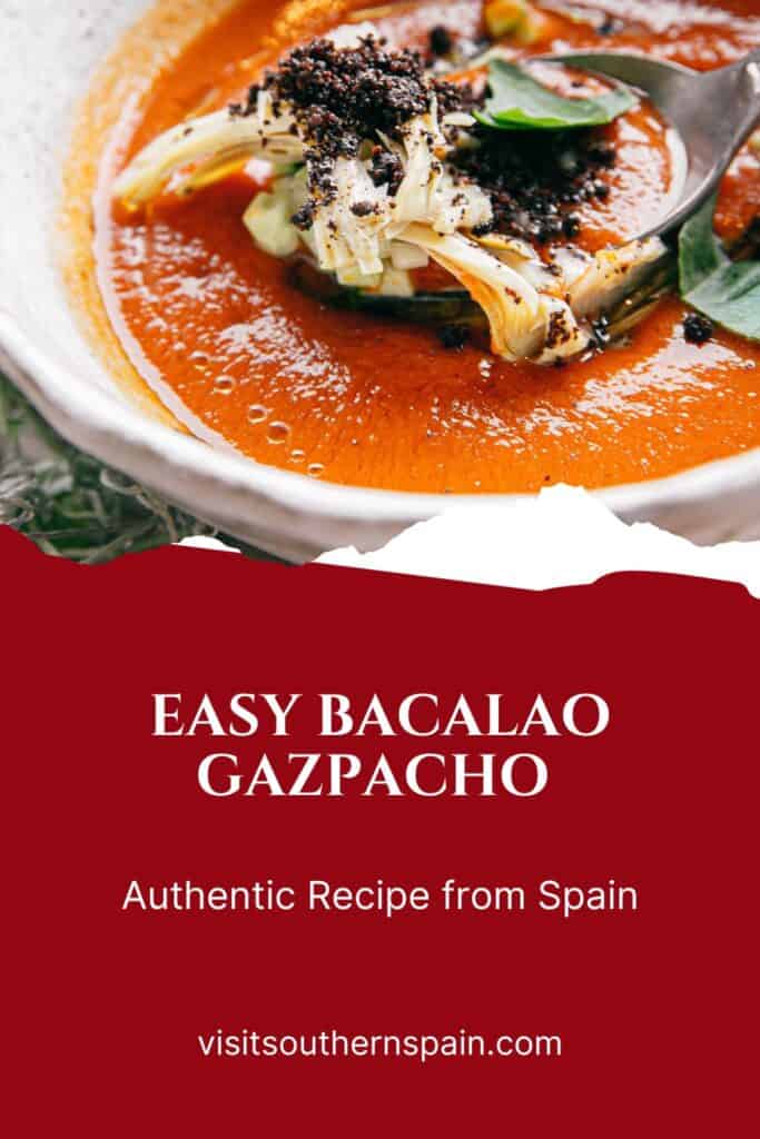 a pin with a bowl of bacalao gazpacho decorated with slices of cod fish.