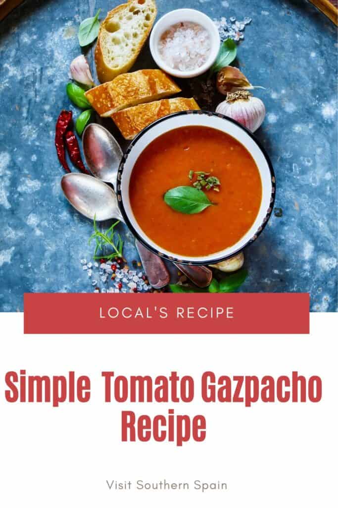 a pin with the best tomato gazpacho in a bowl with gazpacho ingredients next to it.