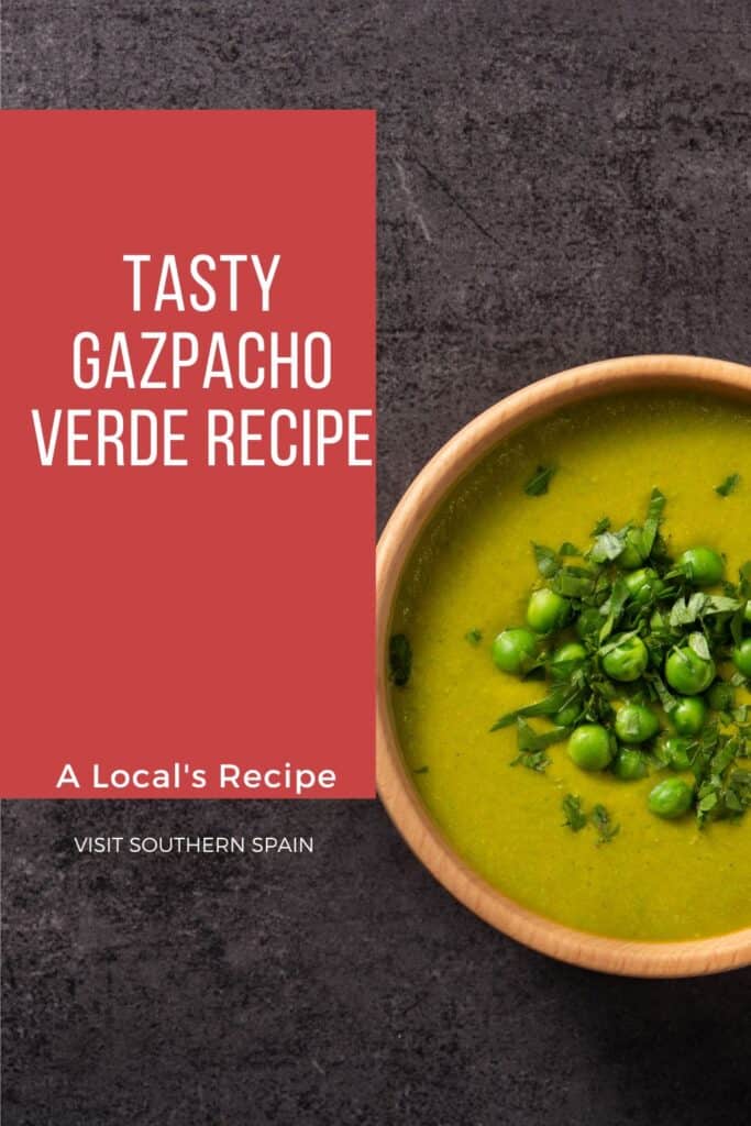 a pin with gazpacho verde in a clay bowl decorated with green peas.