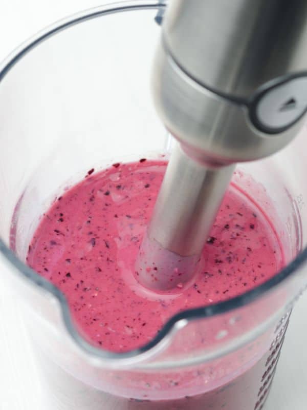 blueberry cold soup being made with a blender