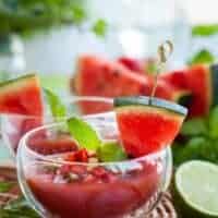 gazpacho without tomatoes in a glass bowl decorated with watermelon