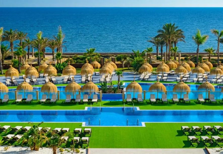 pool area with sun lounges at Cabogata Beach Hotel, luxury hotes in Andalucia