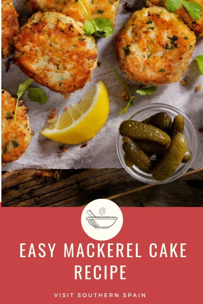 a pin with fish cakes on a wooden board made with the mackerel cake recipe.