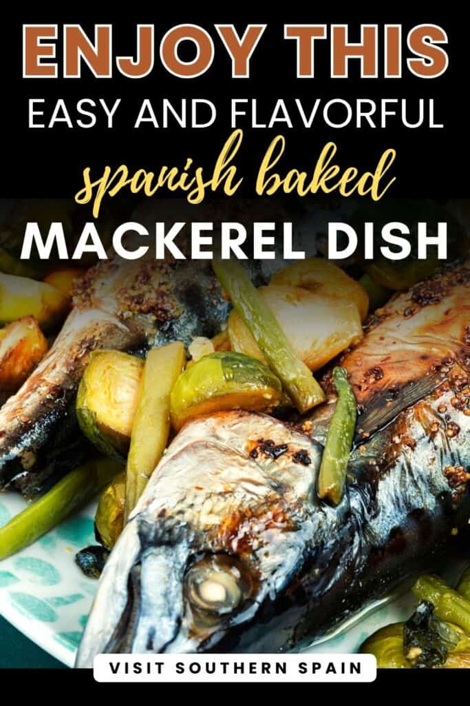 A close up photo of a baked mackerel is seen. It has some vegetables with the fish.