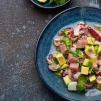 a plate of Spanish Mackerel Ceviche with avocado