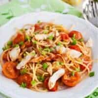 a plate of mackerel pasta recipe with tomatoes