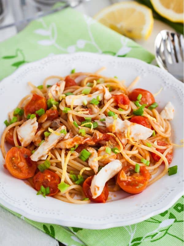 a plate of mackerel pasta recipe with tomatoes