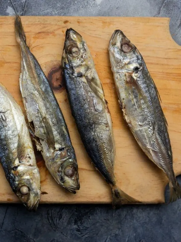salted mackerel recipe on a wooden board.