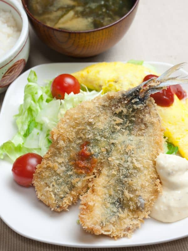 Spanish Mackerel Cutlets on a plate with salad