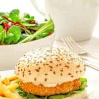 a burger and fries on a plate made with the Mackerel Burger Recipe
