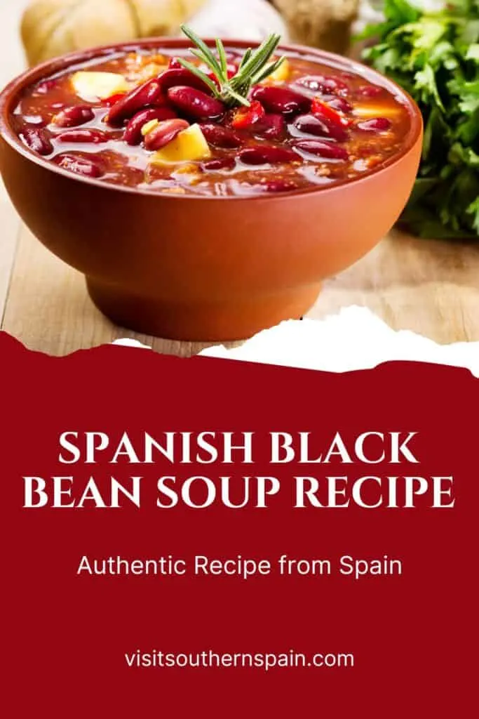 a pin with a Spanish black bean soup served in a bowl.